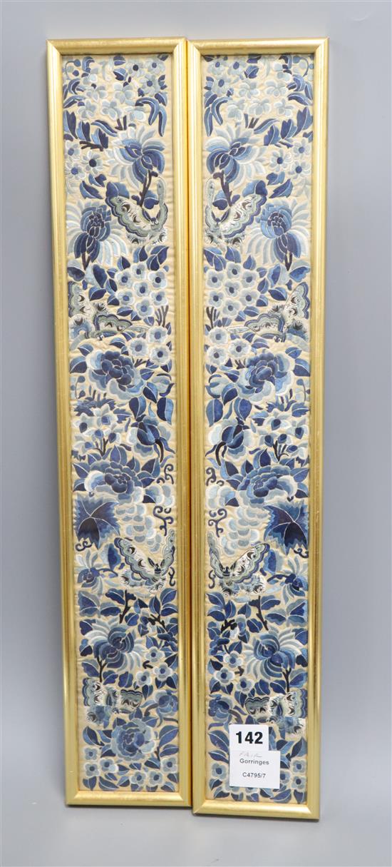A pair of Chinese silk embroidered sleeve panels, framed 58 x 8cm